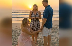 I was relaxing with my husband on the beach when a woman came up to us, knelt down in front of my husband and exclaimed his name.